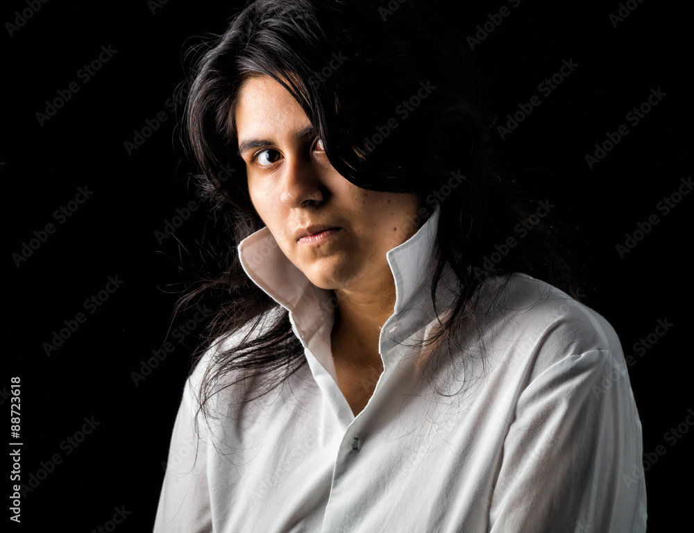 Latina teen in white on black backdrop Latina teen in white on black backdrop