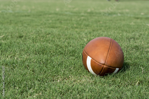 Football on grass background