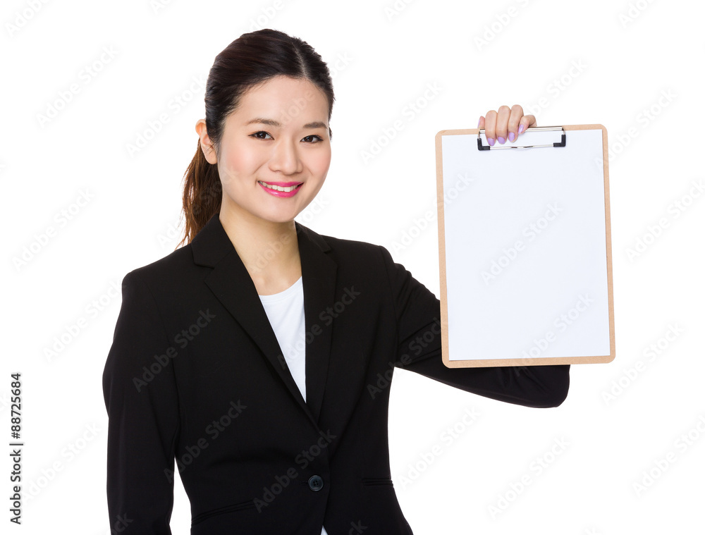 Young businesswoman show with blank paper of clipboard Young businesswoman show with blank paper of clipboard