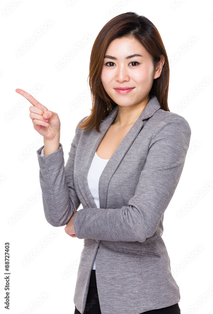 Young businesswoman with finger point up Young businesswoman with finger point up