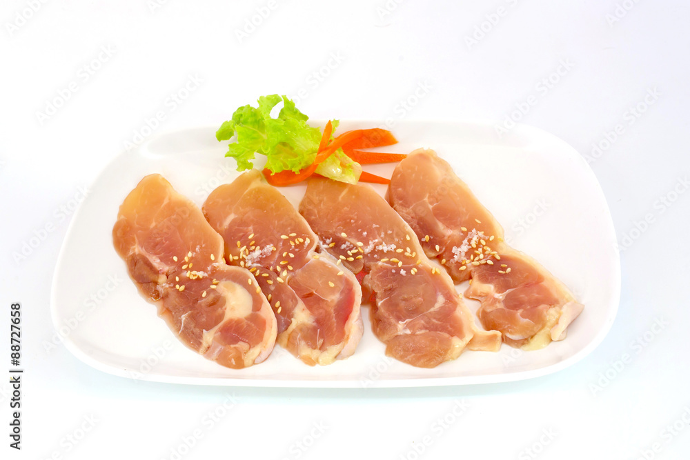 Fresh slices of chicken isoloate on white background ready to be