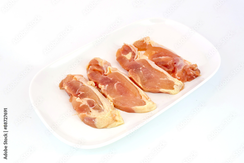 Fresh slices of chicken isoloate on white background ready to be Fresh slices of chicken isoloate on white background ready to be