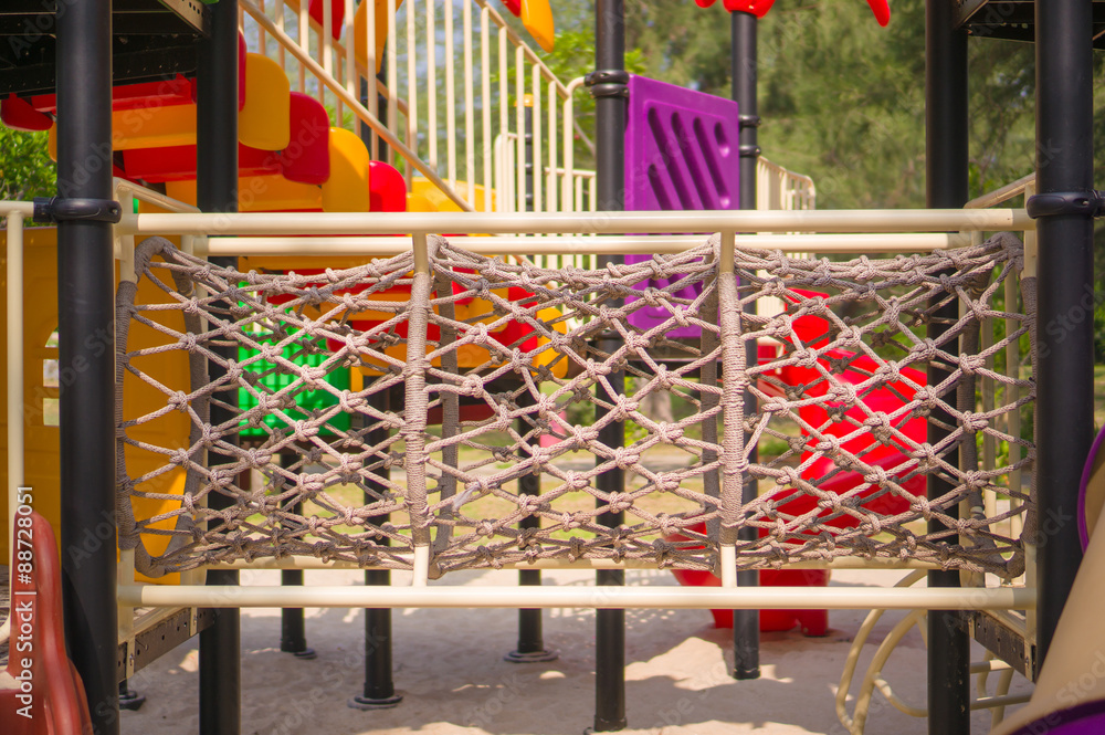 Rope crawl pipe labyrinth on modern kids playground Rope crawl pipe labyrinth on modern kids playground
