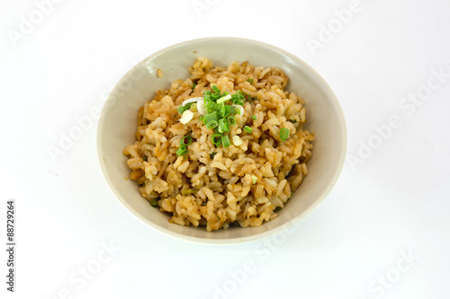 garlic fried rice with vegetable on top