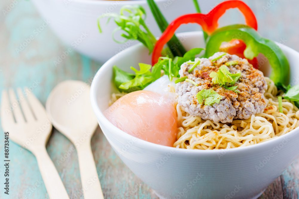Chinese noodles with minced pork and egg in bowl Chinese noodles with minced pork and egg in bowl