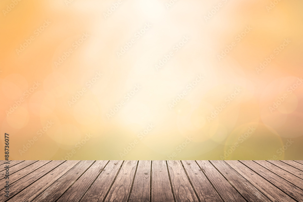 wooden floor with sunset sky blurred background