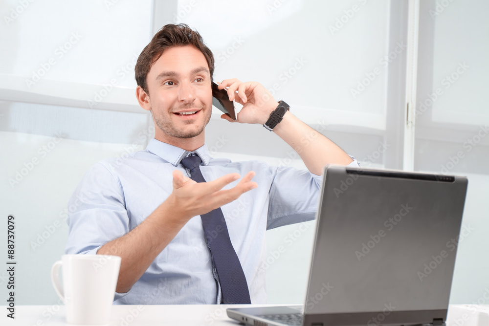 Fototapeta premium Call center operator talking on mobile phone 