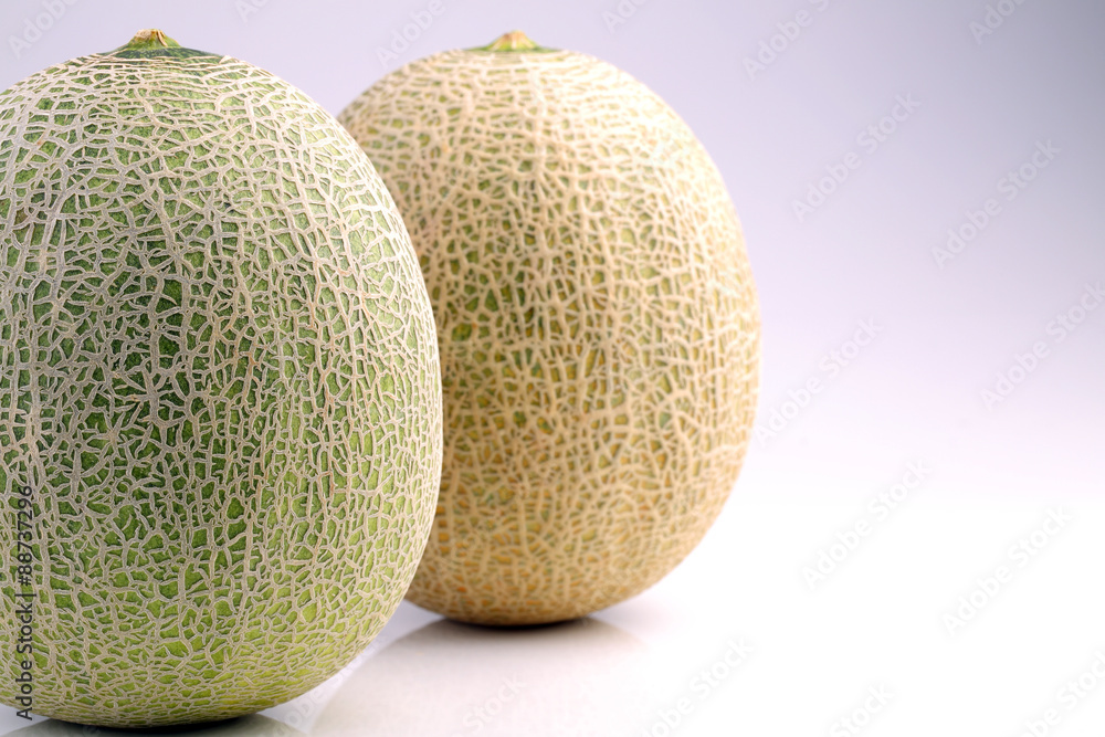 Fresh organic Japanese melon isolated on white background Fresh organic Japanese melon isolated on white background