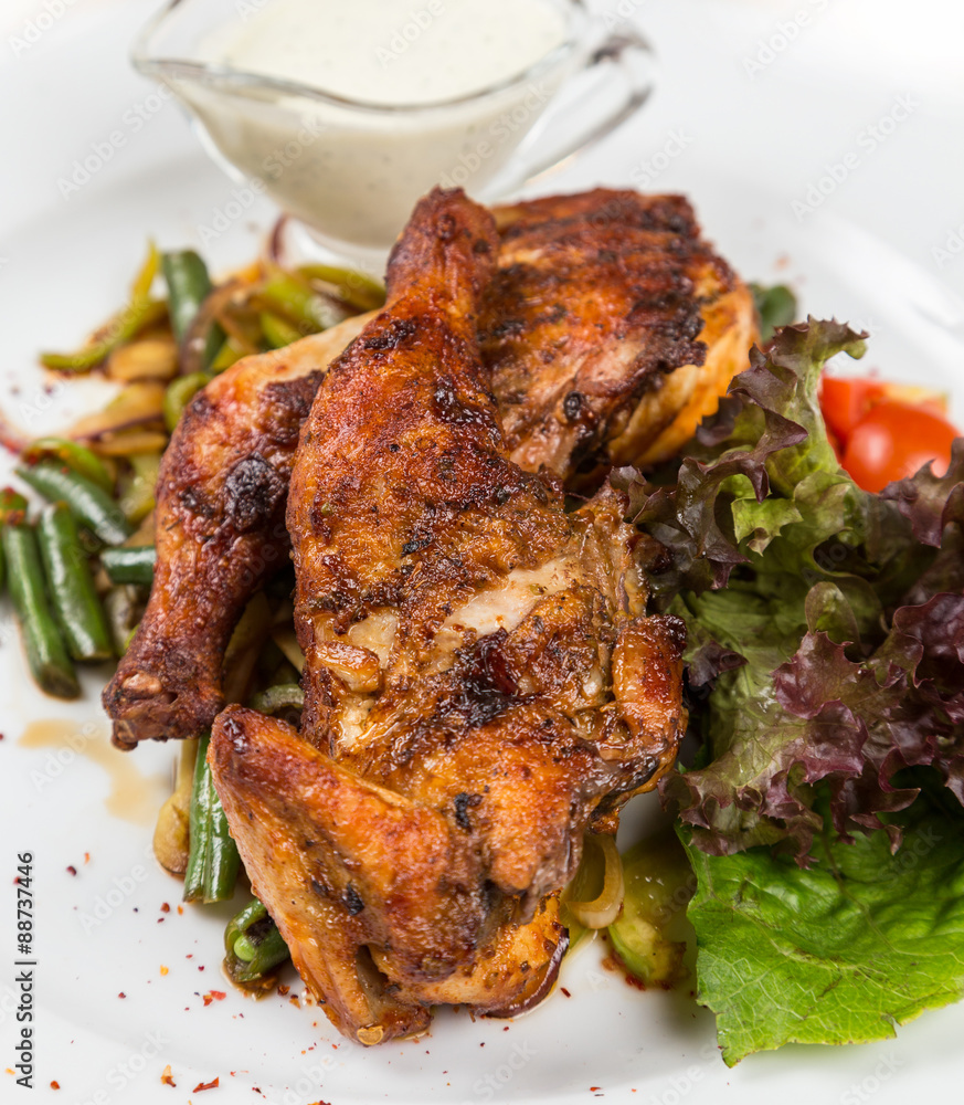 roasted chicken with vegetables serving in restaurant roasted chicken with vegetables serving in restaurant