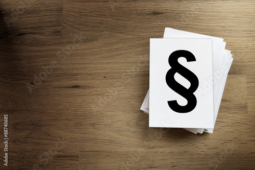 Paper card with paragraph sign