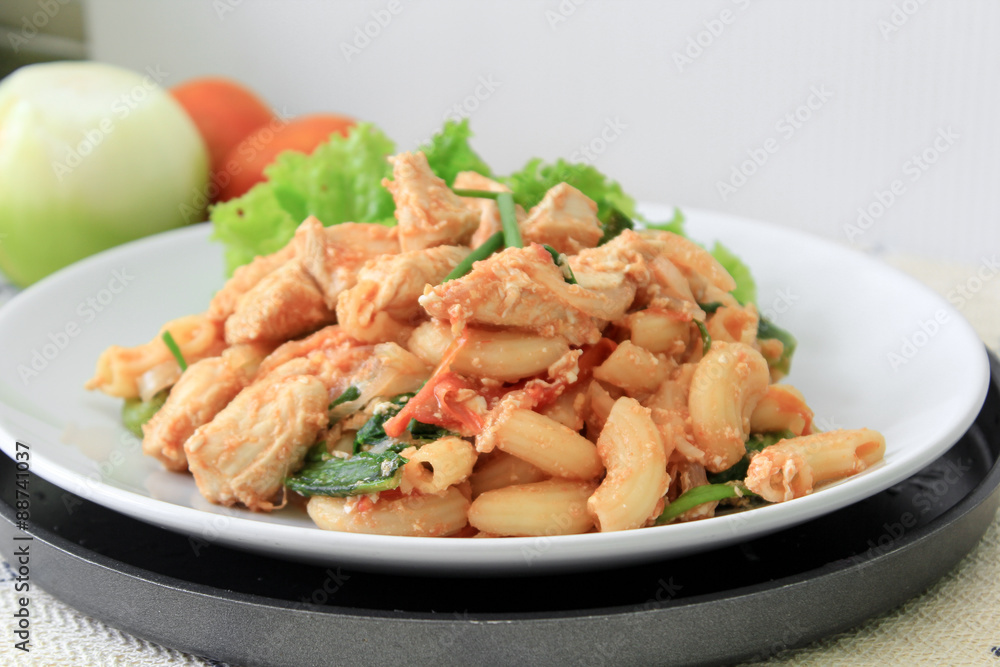 Fried macaroni with chicken and tomato sauce Fried macaroni with chicken and tomato sauce