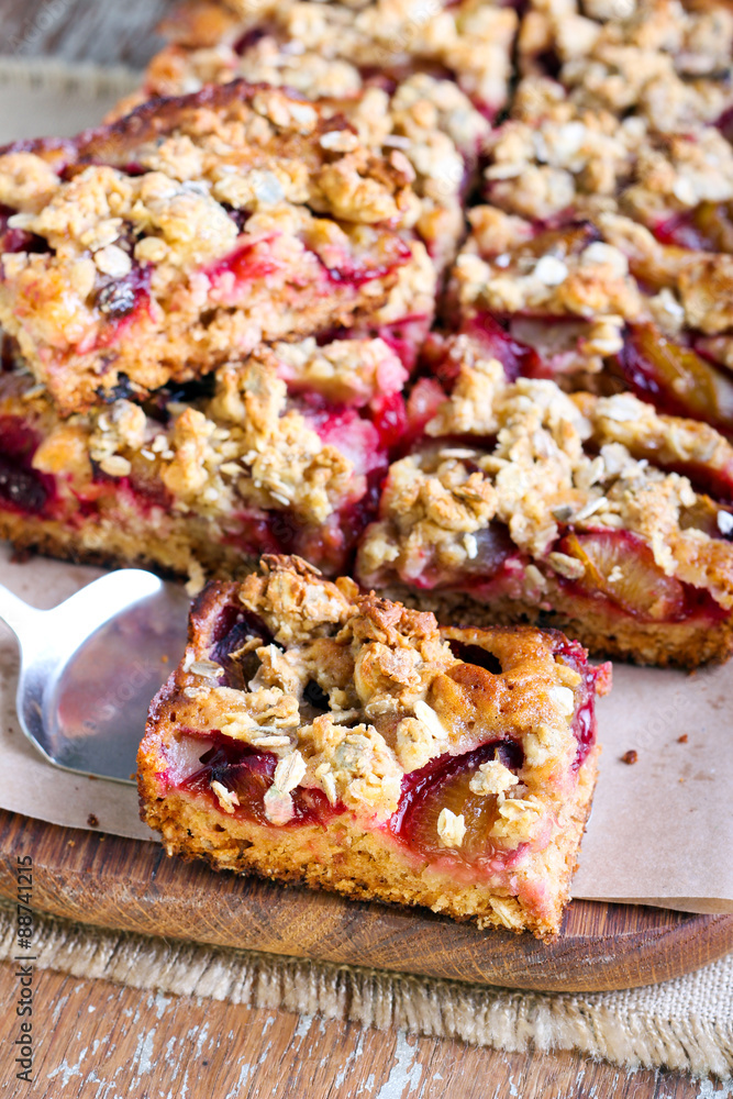 Oaty plum gingerbread slices on board Oaty plum gingerbread slices on board