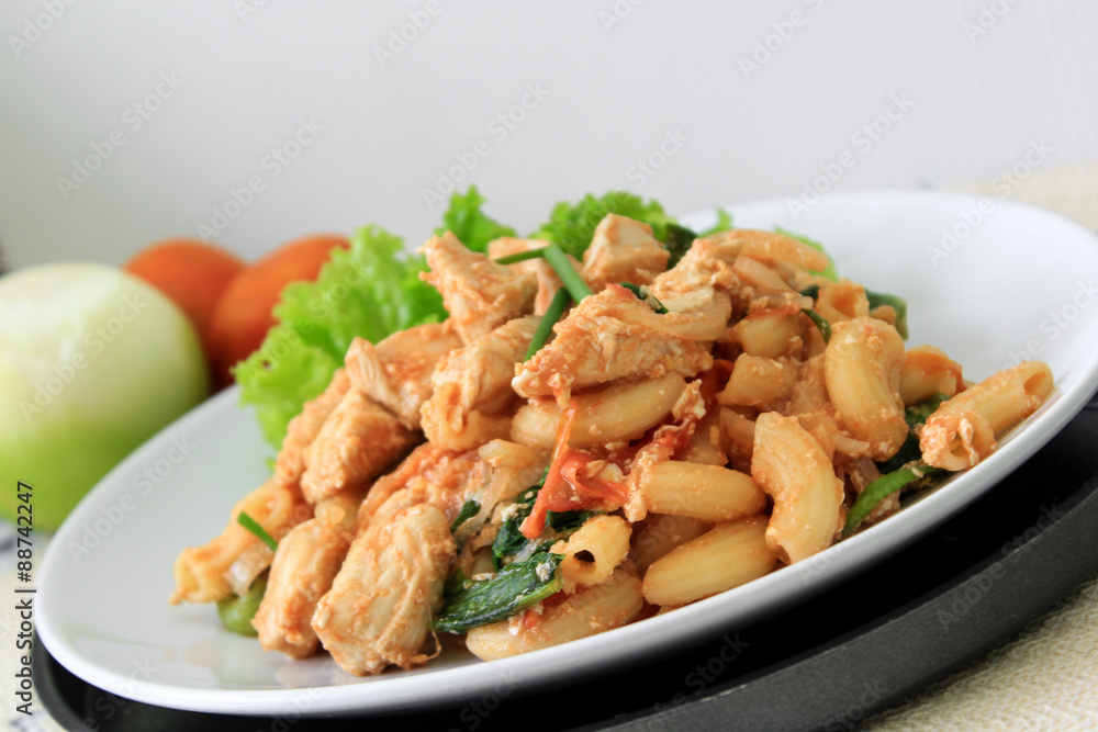 Fried macaroni with chicken and tomato sauce Fried macaroni with chicken and tomato sauce