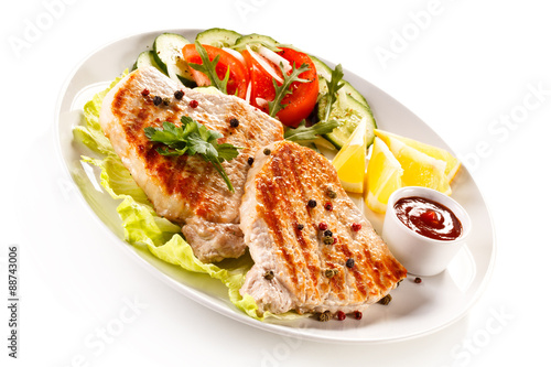 Grilled steaks and vegetable salad 