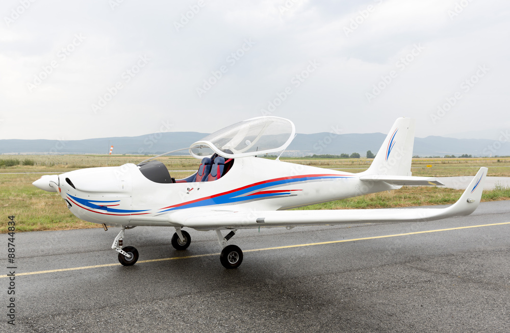 Small two-seated propeller airplane Small two-seated propeller airplane