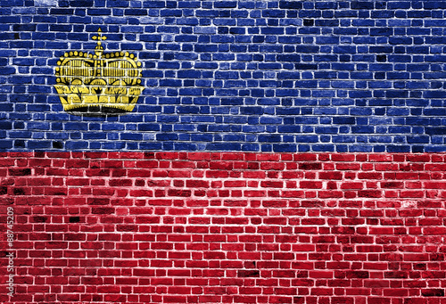 Flag of Liechtenstein painted on brick wall, background texture