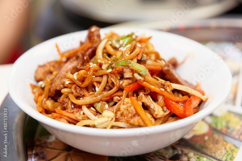 Noodles cooked in wok, asian food