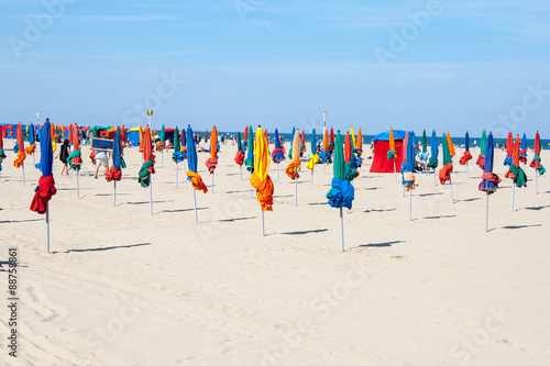 colorful umbrellas on the beach of Deauville France