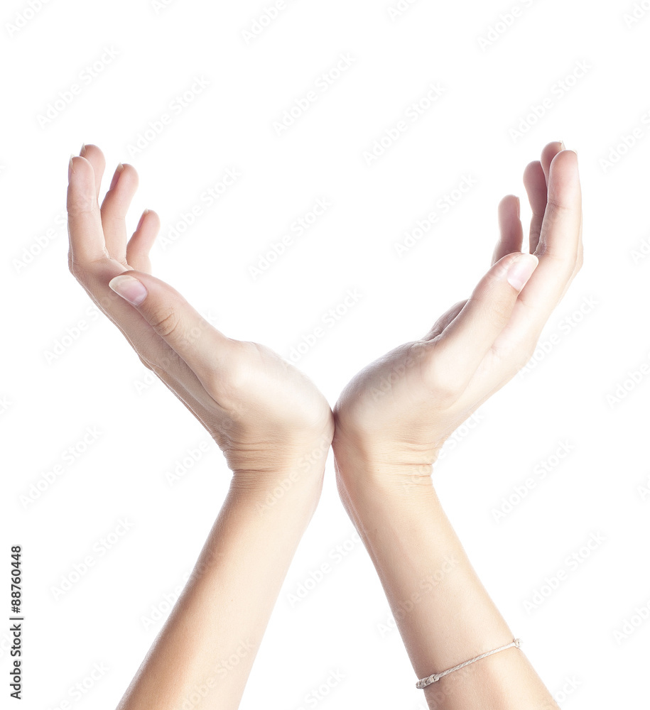 Female hand to create a collage, isolated on white Female hand to create a collage, isolated on white