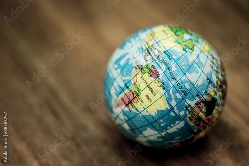 An image of a ball with world map photo