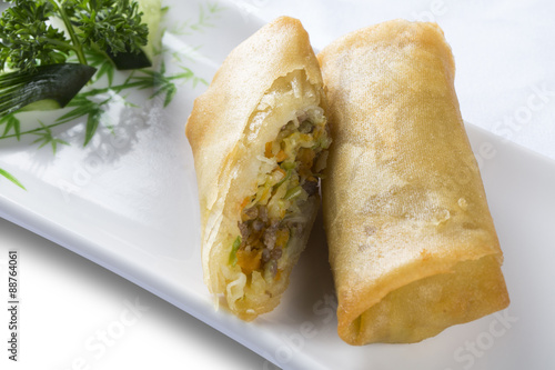 Spring Rolls - Fried vegetable spring rolls served with sweet ch photo