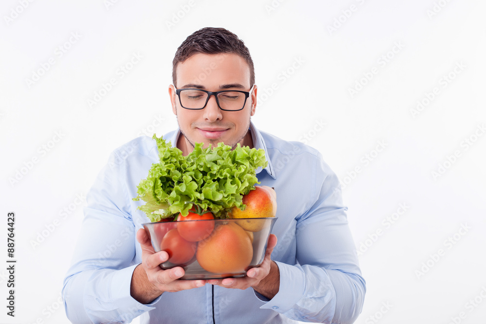 Handsome young fit man prefers healthy eating Handsome young fit man prefers healthy eating