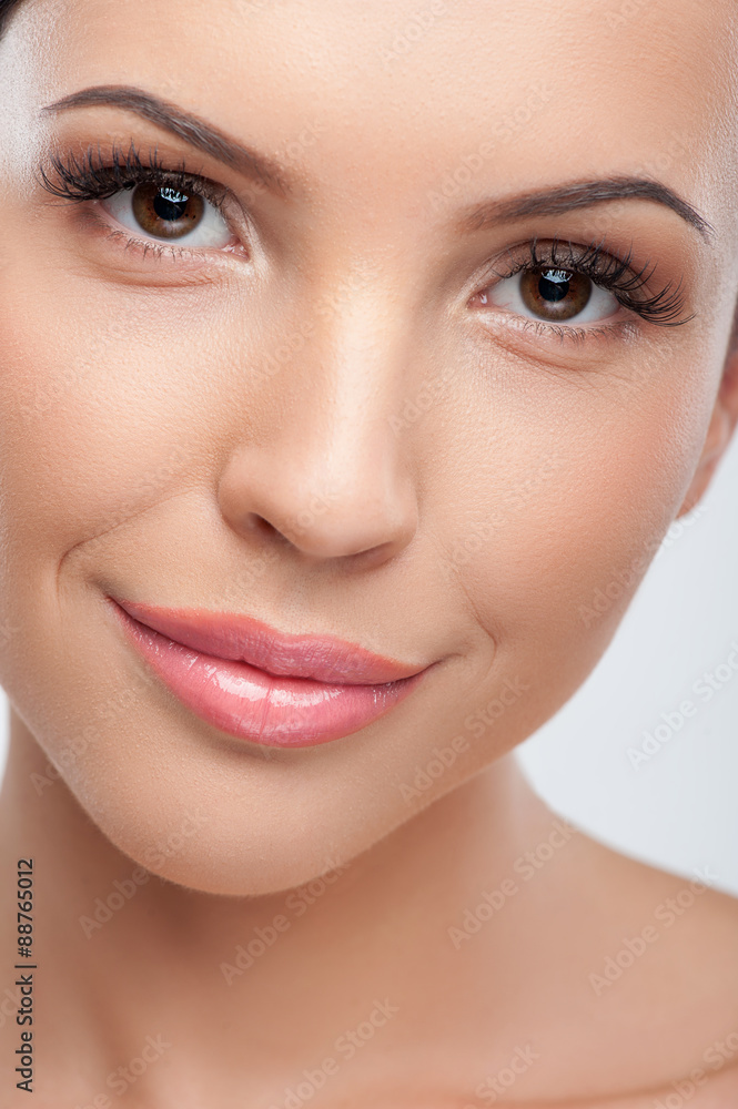 Attractive young woman caring of her body Attractive young woman caring of her body
