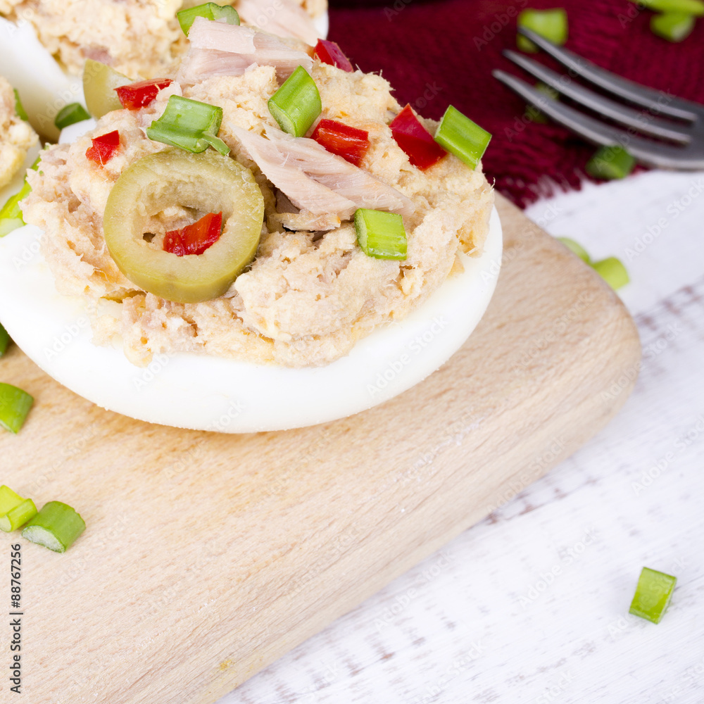 stuffed eggs with tuna, olives and paprika stuffed eggs with tuna, olives and paprika