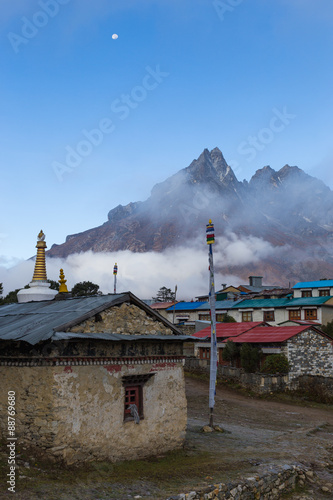 Buddhist monastery morning fog, Tengboche village, Nepal. photo