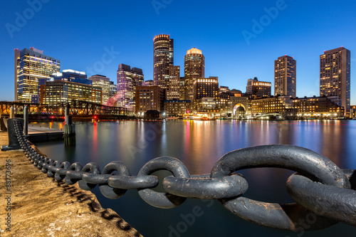 Boston skyline at dusk as viewed from Fan Pier Park. photo