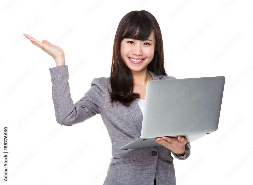 Asian young businesswoman hold with laptop computer and hand sho Asian young businesswoman hold with laptop computer and hand sho