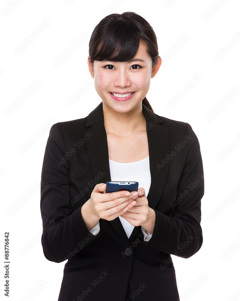 Businesswoman use of the cellphone Businesswoman use of the cellphone