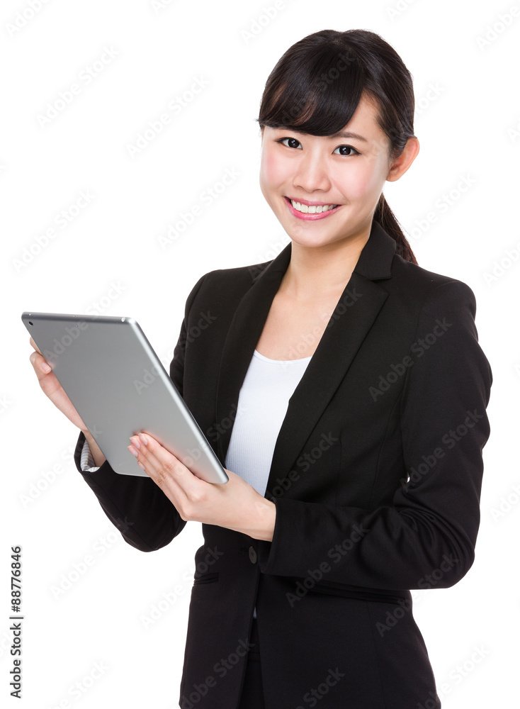 Asian young Businesswoman use of the tablet pc Asian young Businesswoman use of the tablet pc