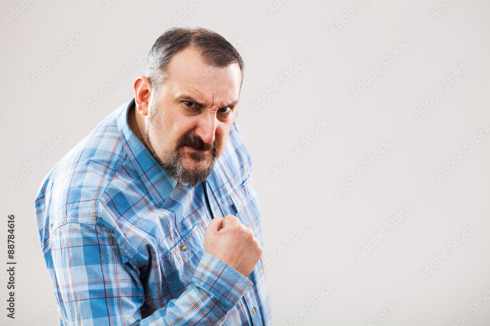 Portrait of angry man who threatens Portrait of angry man who threatens