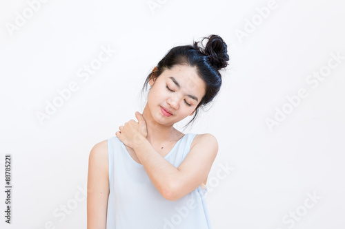 Young asian student suffering from a neck pin