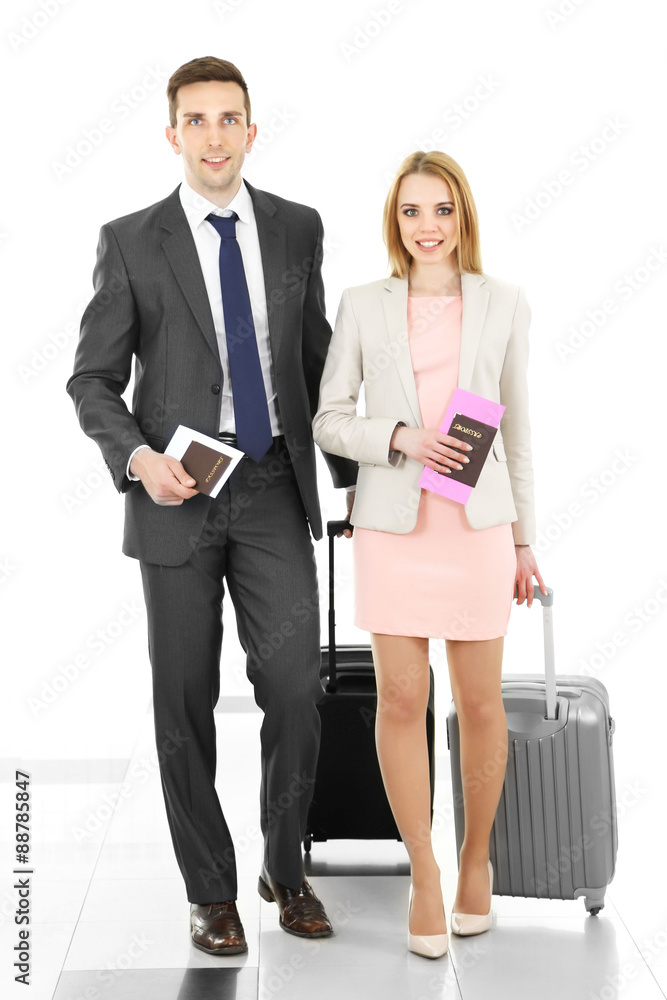 Portrait of young happy couple with baggage in airport Portrait of young happy couple with baggage in airport