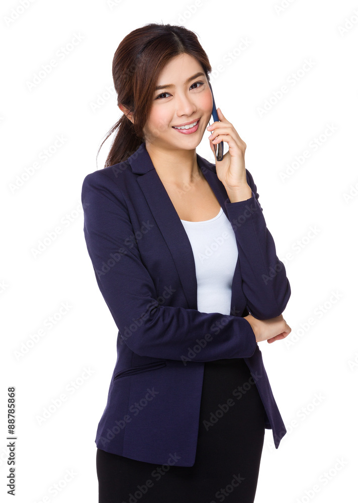 Asian Young businesswoman talk to cellphone Asian Young businesswoman talk to cellphone