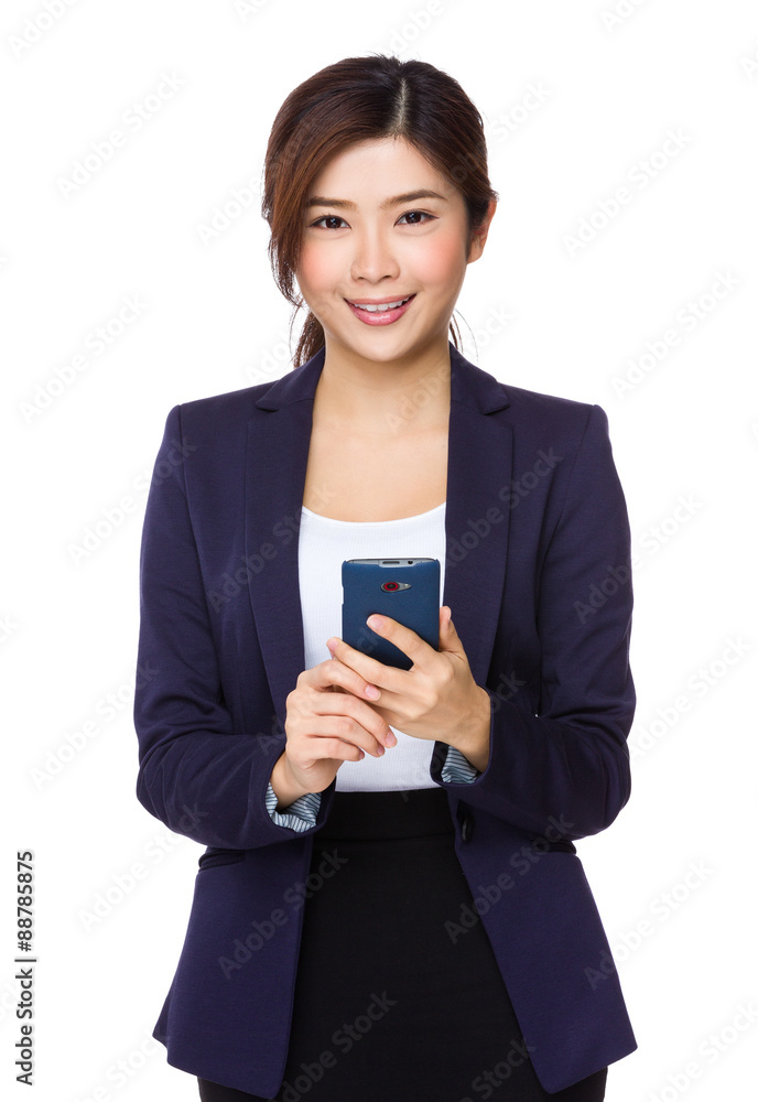 Businesswoman use of the cellphone Businesswoman use of the cellphone