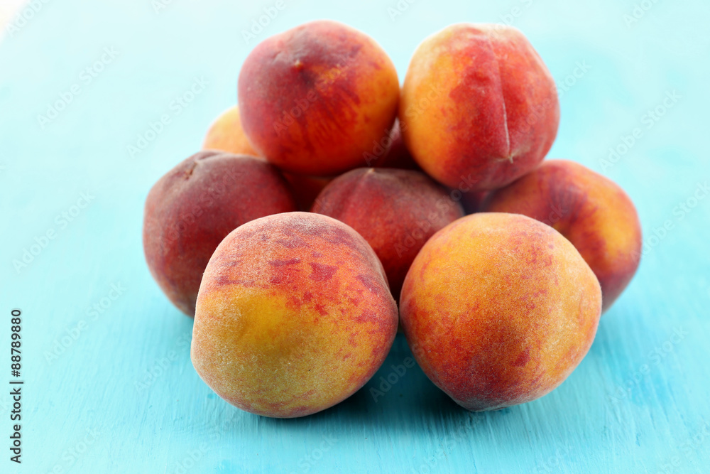 Sweet ripe peaches on table close up Sweet ripe peaches on table close up