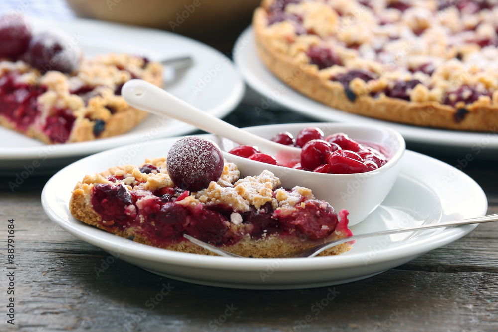 Tasty homemade pie with cherries on table close up Tasty homemade pie with cherries on table close up