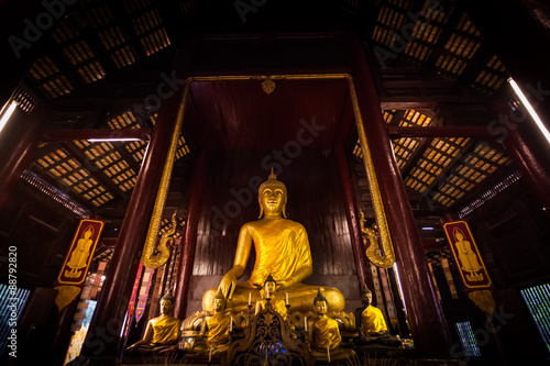 Canvas Print Golden buddha statue in temple. Places of worship.