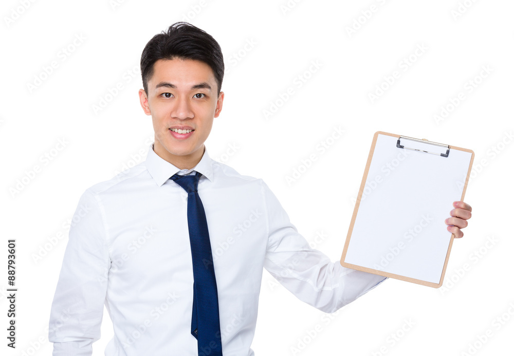 Young businessman show with blank page of clipboard Young businessman show with blank page of clipboard