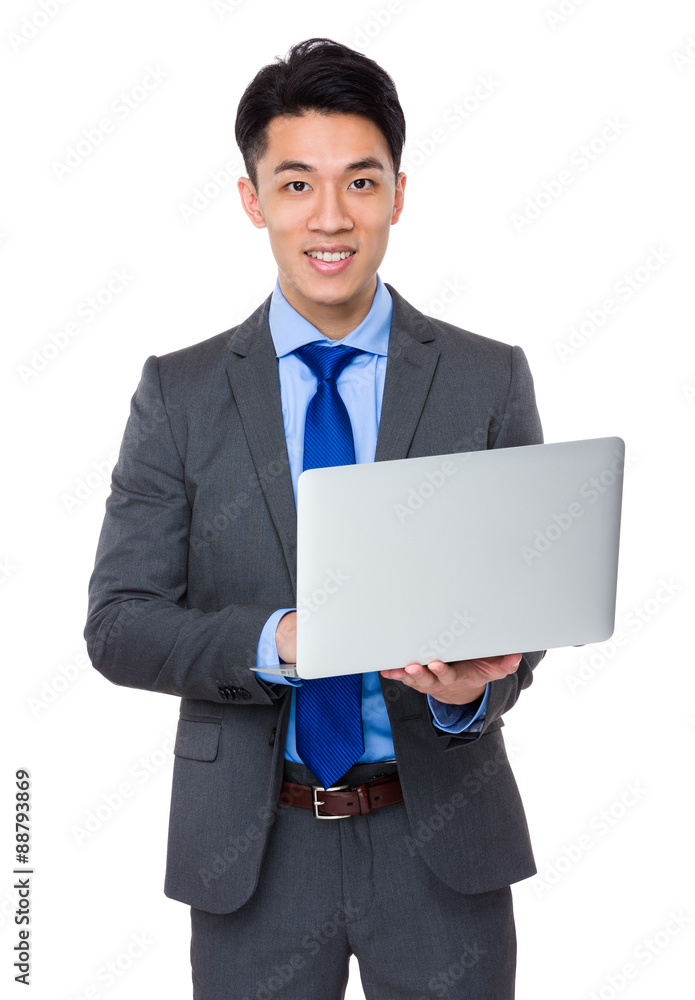 Young Businessman use of the notebook computer Young Businessman use of the notebook computer