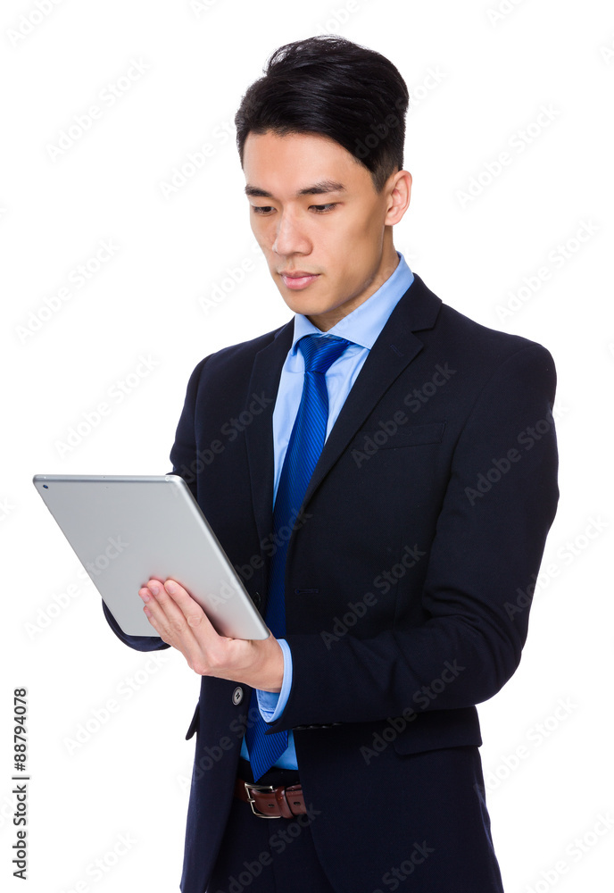 Businessman use of the digital tablet pc Businessman use of the digital tablet pc