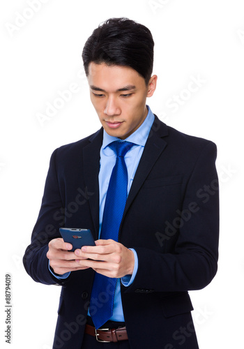 Asian young businessman use of the tablet pc
