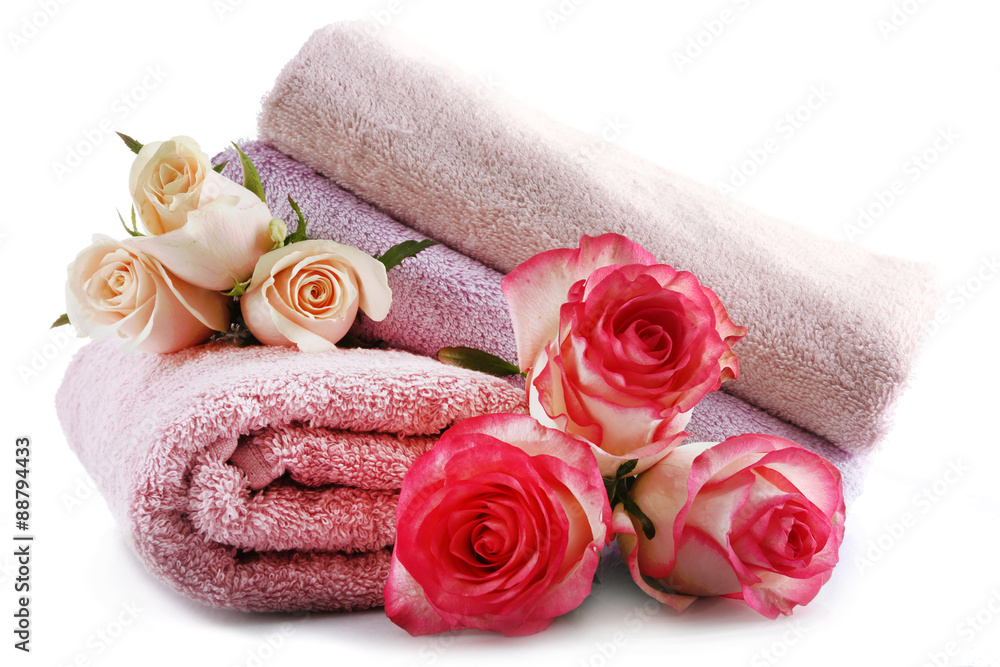Stack of colorful towels isolated on white Stack of colorful towels isolated on white