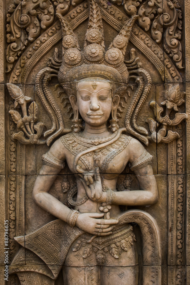 Old carving on the wall in a temple