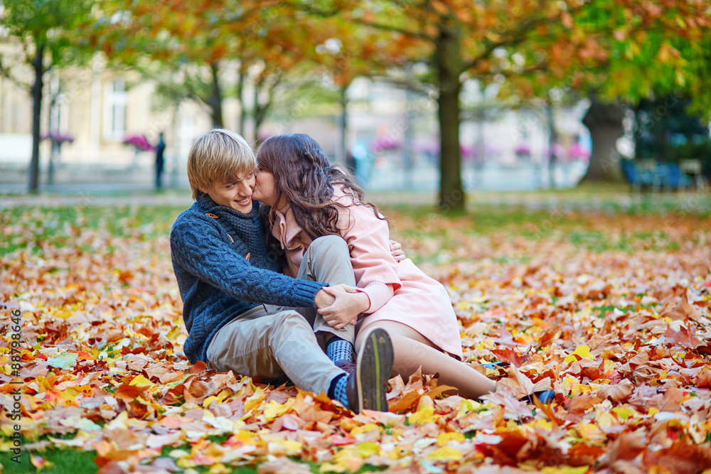 Young dating couple in Paris on a bright fall day Young dating couple in Paris on a bright fall day