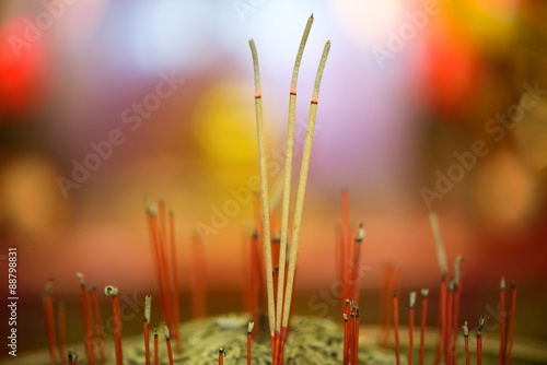 Incense sticks in Malaysian buddhist temple photo