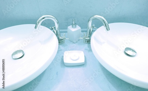 Close up of modern sink in the bathroom photo